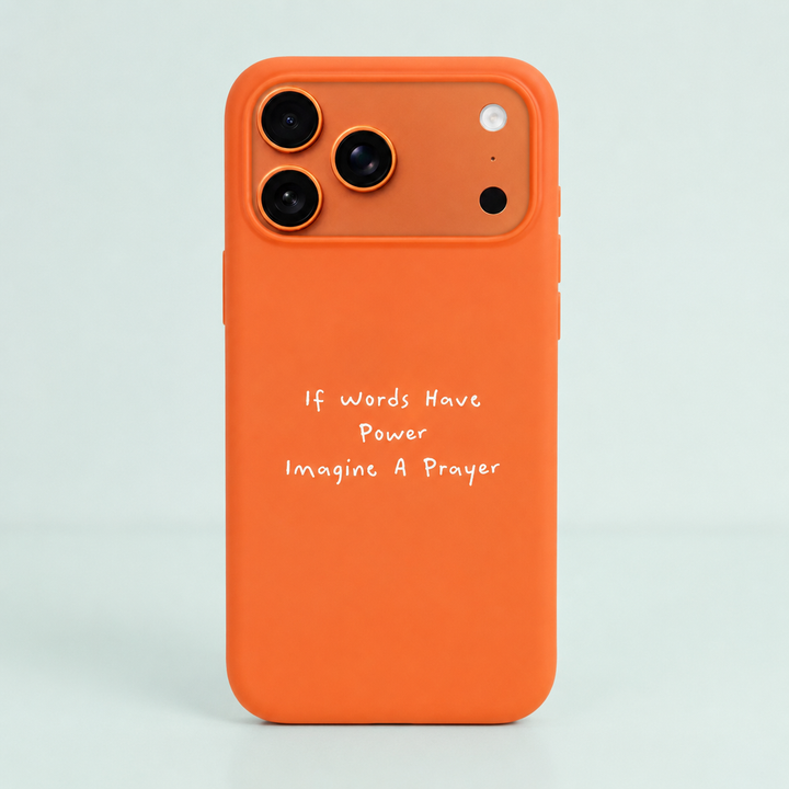 An orange phone case with a white handwritten-style text quote that reads 'If Words Have Power, Imagine A Prayer', shown on a light gray background.